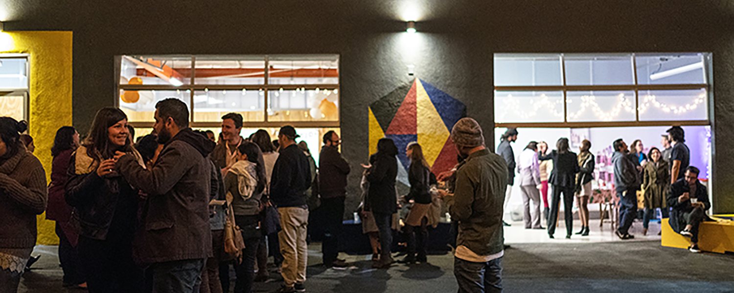 An evening community event outside City Labs Boyle Heights